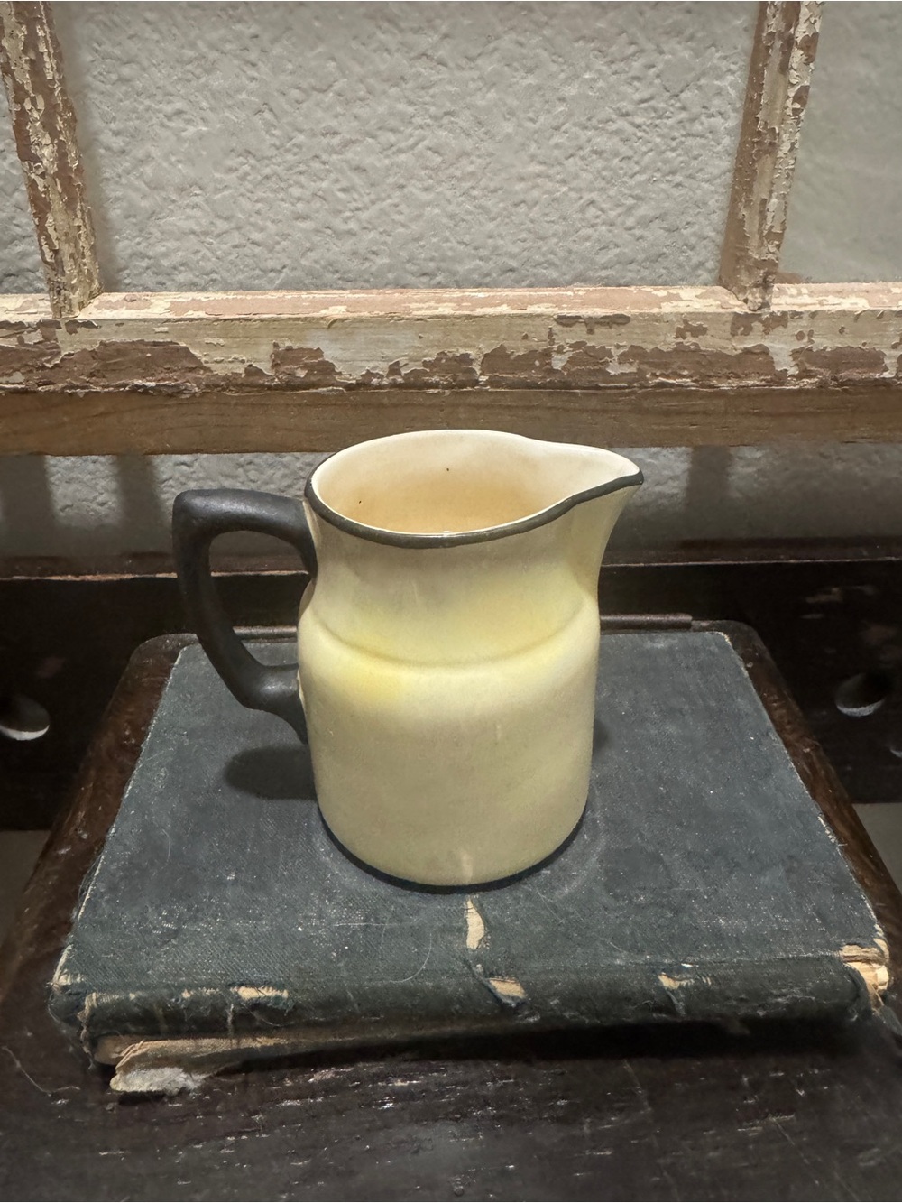 Vintage Yellow Cream Ceramic Pitcher with Black Handle